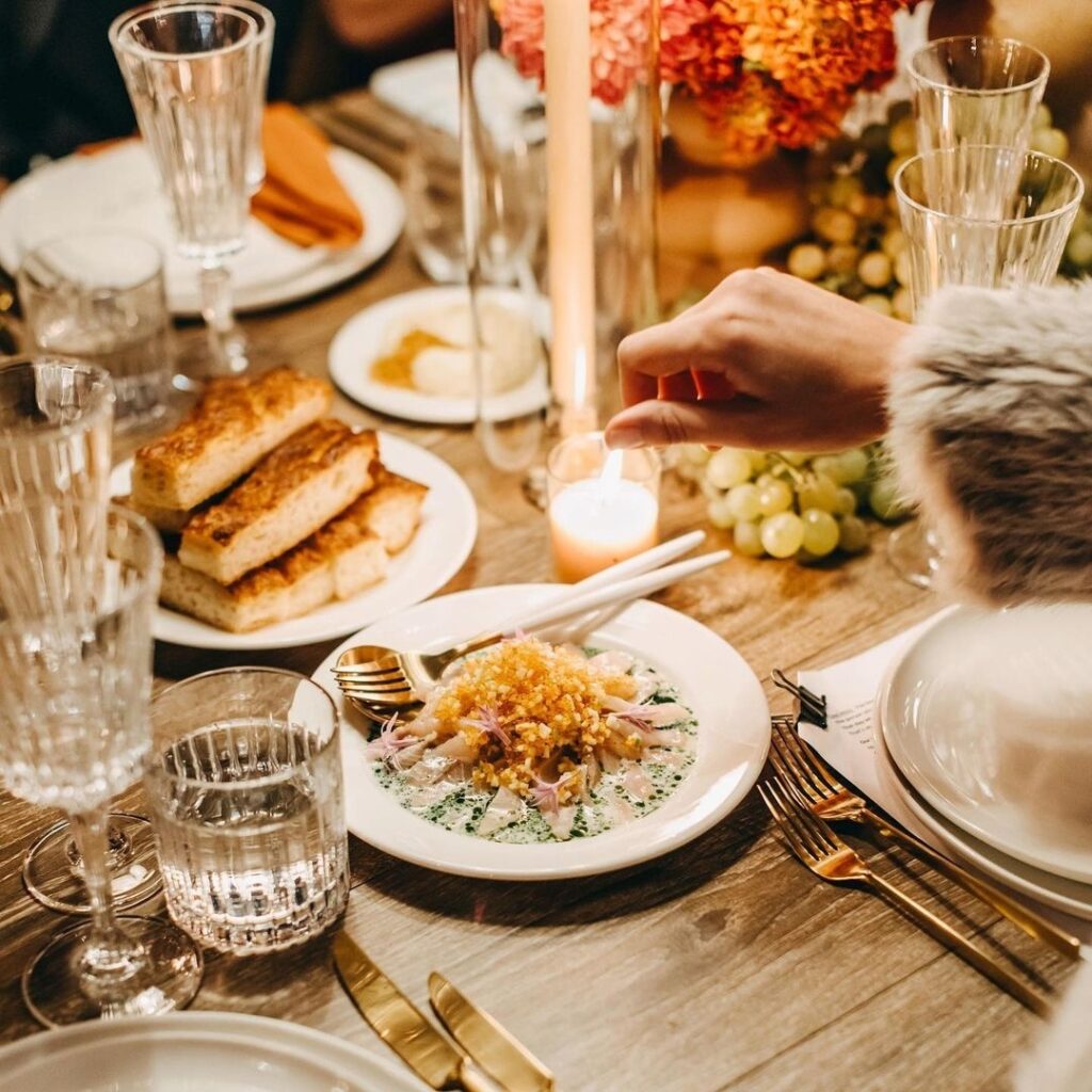Close up of winter wedding sit-down reception tables and dinner