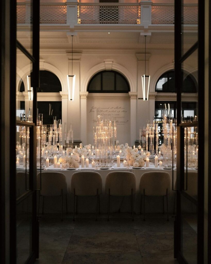 White candle-lit winter wedding table setting